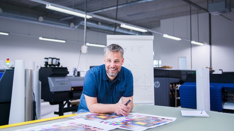 Colorbase CEO Marco Roos smiles into the camera.